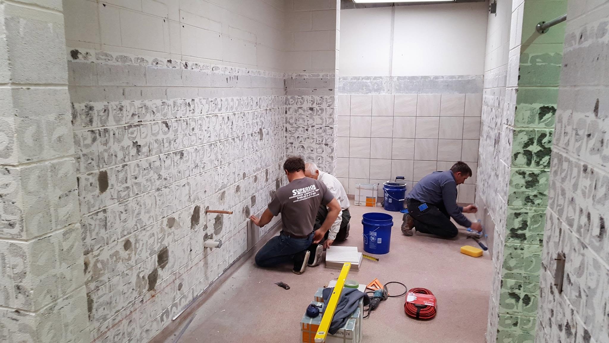 Daniel Aseyev and his crew on site during a remodel for STW Home Remodeling