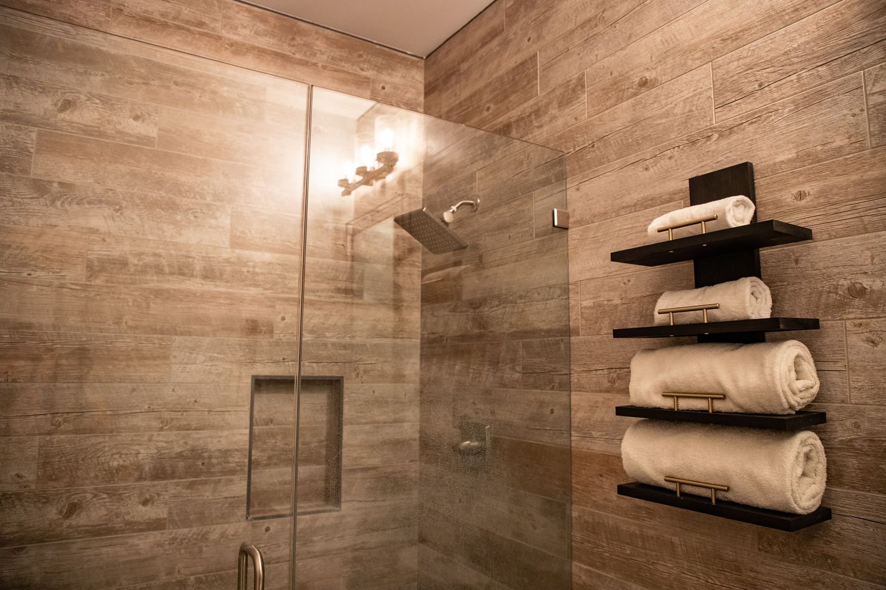 Wood-look plank tile walk-in shower